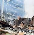 Prédios na cidade ucraniana de Kharkiv foram reduzidos a ruínas pela Rússia  Foto: Getty Images / BBC News Brasil