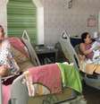 Alina, Natalia e Dra. Yaraschuck: momento de descontração na Enfermaria 5  Foto: DW / Deutsche Welle