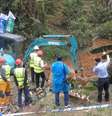 Equipes trabalham em local de queda de avião na China  Foto: CGTN