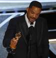 Will Smith ao receber o Oscar de Melhor Ator durante a cerimônia realizada em 27 de março   Foto: Reuters
