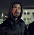 Alfred Enoch e Seu Jorge em cena do filme 'Medida Provisória'  Foto: Globo Filmes