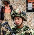 O exército está nas ruas de algumas cidades colombianas após o toque de recolher  Foto: Getty Images / BBC News Brasil