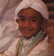 Imagem mostra o quilombola Luan Manzo, com vestes típicas da religião candomblé  Foto: Imagem: Acervo Pessoal / Alma Preta