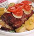 Guia da Cozinha - Costela assada no forno com batata e tomate  Foto: Guia da Cozinha