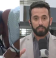 O ataque aconteceu enquanto o homem era retirado da viatura  Foto: Reprodução/ TV Record