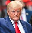 Donald Trump disse que o FBI não precisaria ter entrado em sua casa e que ele devolveria o material se autoridades tivessem pedido  Foto: Getty Images / BBC News Brasil