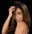 Anitta deixou o cabelo liso para trás.  Foto: Reprodução/Instagram / Estadão
