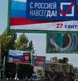 Propaganda em uma rua de Lugansk diz: "Com a Rússia para sempre, 27 de setembro"  Foto: DW / Deutsche Welle