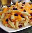 Batata frita com cheddar, bacon e parmesão | Foto: Guia da Cozinha  Foto: Guia da Cozinha