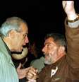 Lula conversa com o então prefeito de Santo André, Celso Daniel, durante comício em 2000  Foto: Estadão