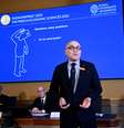 Membros da Academia Real das Ciências da Suécia apresentam o Prêmio Nobel de Ciências Econômicas de 2022  Foto: Reuters
