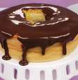 Guia da Cozinha - Cremoso e delicioso! Faça um bolo de tapioca com calda de chocolate  Foto: Guia da Cozinha
