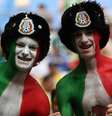 Torcedores mexicanos se pintam com a bandeira do país para acompanhar jogo de Copa do Mundo.  Foto: WILTON JUNIOR /ESTADAO / Estadão