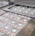 Paxlovid, pílula anticovid da Pfizer, sendo manufaturada em Ascoli, na Itália.  Foto: Divulgação/Pfizer / Estadão
