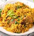 Guia da Cozinha - Na cozinha da sede da Copa: conheça o arroz majboos, prato típico do Catar  Foto: Guia da Cozinha