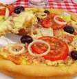 Guia da Cozinha - Pizza portuguesa: prepare essa delícia na panela de pressão!  Foto: Guia da Cozinha