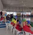 Adolescentes com acessórios da cor da bandeira do Brasil  Foto: Divulgação/Fundação Casa