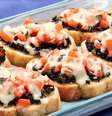 Guia da Cozinha - Entrada pronta em 20 minutos: veja como fazer bruschetta caprese  Foto: Guia da Cozinha