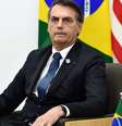 PF vai investigar se houve omissão de agentes públicos no território yanomami durante governo Bolsonaro  Foto: Brendan Smialowski/AFP / BBC News Brasil