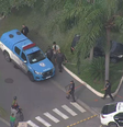 Policiais atendem caso de triplo homicídio no Rio   Foto: TV Globo