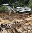 Chuvas e deslizamentos provocaram destruição no litoral paulista  Foto: EPA / Ansa - Brasil
