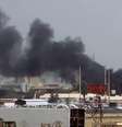 Fumaça acima dos prédios do aeroporto de Cartum  Foto: Getty Images / BBC News Brasil