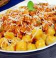 Nhoque de mandioca com ragu de linguiça  Foto: Guia da Cozinha