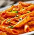 Macarronada com molho de linguiça toscana  Foto: Guia da Cozinha