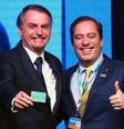 Jair Bolsonaro e Pedro Guimarães, ex presidente da Caixa, em evento em junho de 2022  Foto: Antonio Cruz/Agência Brasil