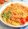 Espaguete com tomate e rúcula  Foto: Guia da Cozinha