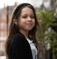 A menina, que atende pelo título de 'A Filha do Bilionário', geralmente está vestida da cabeça aos pés com grifes  Foto: Emily Abraham