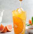 Suco de laranja com mel  Foto: Guia da Cozinha