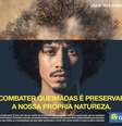 Imagem de um homem negro de black power relaciona o volume do cabelo com árvores queimadas e foi publicada em jornais impressos  Foto: Reprodução