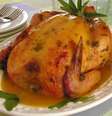 Frango assado com molho de laranja  Foto: Guia da Cozinha