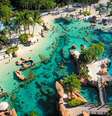 Paraíso artificial: as piscinas do Discovery Cove recriam o ambiente marinho e são habitadas por peixes e raias  Foto: // / Viagem e Turismo