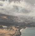 Vista aérea de prédios danificados e fumaça na cidade de Lahaina  Foto: EPA / BBC News Brasil