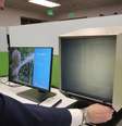 Pesquisador do FamilySearch lê uma microficha  Foto: Edison Veiga / BBC News Brasil