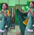 Michelle Bolsonaro usava a bandeira do BRasil nas costas  Foto: Reprodução/Facebook
