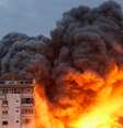 Prédio é bombardeado em Israel   Foto: Ashraf Amra 