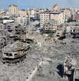 Imagem aérea mostra prédios e casas destruídos por bombardeios israelenses na cidade de Gaza  Foto: REUTERS/Mohammed Salem