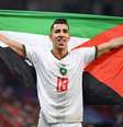 Na última Copa, jogadores de Marrocos exibiram bandeiras da Palestina  Foto: Matthias Hangst/Getty Images