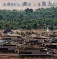 Veículos militares e soldados israelenses perto da fronteira com Gaza  Foto: HANNIBAL HANSCHKE/EPA-EFE/REX/Shutterstock / BBC News Brasil