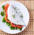 Tapioca com tomate e rúcula  Foto: Adao | Shutterstock / Portal EdiCase