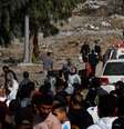 Comboio de ambulâncias e um caminhão da ONU entrando em Gaza após início da trégua  Foto: DW / Deutsche Welle