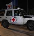 Carro da Cruz Vermelha transporta reféns libertados pelo Hamas   Foto: Ibraheem Abu Mustafa