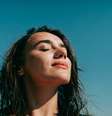 Mulher tomando sol  Foto: iStock