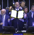 Lula, Pacheco e Lira na promulgação da reforma tributária   Foto: Reprodução