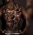  Foto: Instagram gangatatoo - Legenda: Vini Jr faz tatuagem marcante com personalidades negras / Jogada10