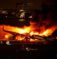 Avião da Japan Airlines pega fogo no aeroporto de Haneda em Tóquio 2/1/2024   Foto: REUTERS/Issei Kato