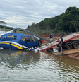 Helicóptero que caiu em MG é retirado da água; veja  Foto: Reprodução/CBMMG